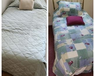 2 twin beds complete with linens.