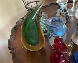 circular table where the top  moves into a vertical position