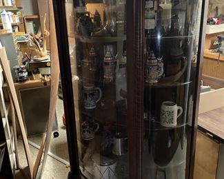 . . . this is an excellent early 1900's clawfoot, curved-glass china cabinet