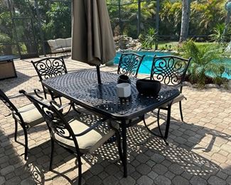 CAST ALUMINUM (doesn’t rust) TABLE WITH 6 CHAIRS, UMBRELLA & BASE
Original cost $2,100