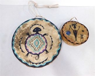 painted drums signed by the artist