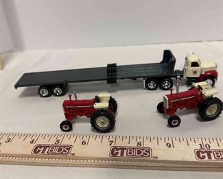 Diecast Collectibles, Including Two Tractors In One Tractor Trailer With A Trailer