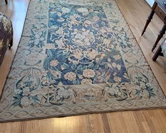 #21	Needlepoint Blue/Green Cream Rug w/flowers, Fruit & Faces - 70x107	 $100.00 
