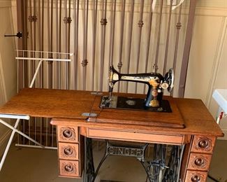 #38	Singer Treadle Sewing machine w/nice Cabinet & Sewing Machine	 $150.00 
