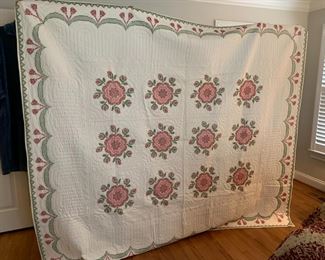 #89	cross stitch hand quilted quilt with pink flowers 84x98 	$75 
