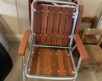 #105	4 vintage wood folding chairs 	$150 
