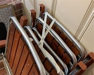 #105	4 vintage wood folding chairs 	$150 
