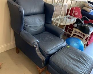 #111	AS IS Silver oak wingback chair with ottoman ball and claw feet blue leather  nail heads	$100 
