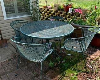 #171	Round Metal Table w/4 chairs 42x28	 $175.00 
