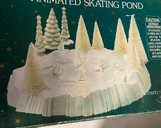 #193 Department 56 animated skating pond as is missing 2 ceramic trees $20