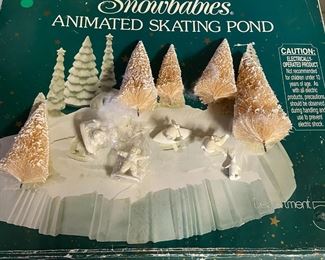 #193 Department 56 animated skating pond as is missing 2 ceramic trees $20