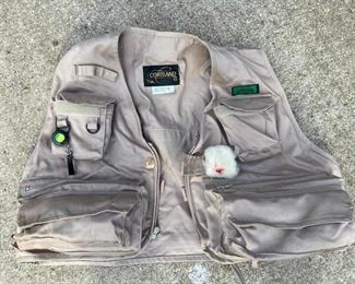 #206 Cortland fishing vest size XL with pockets inside.outside and back $20       