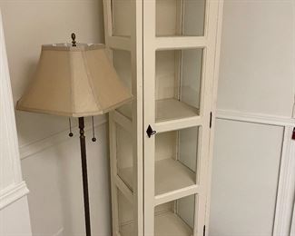 4-tier curio cabinet, and metal floor lamp