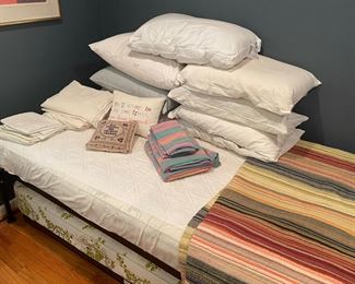 Trundle bed with pull out lower set, pillows, and linens