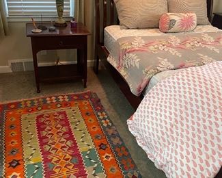 Kilm rug, queen slated sleigh bed (head and footboard), mattress set, nightstands, matched set of ceramic lamps, and duvet and coverlet set