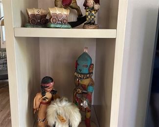 Cast iron, wood and leather dolls