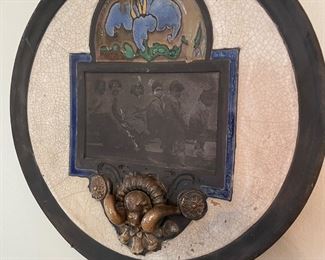 Ceramic and metal artwork with vintage photo