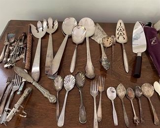 silver-plated flatware and serving pieces