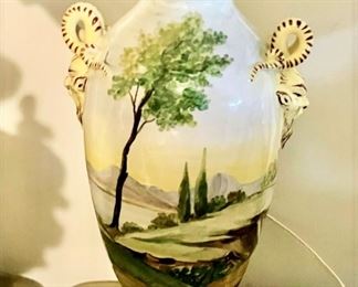 Large Majolica hand painted scene with gargoyle handle faces with marble bottom