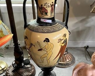 Large vase don't have my notes but sold with beautiful high end iris flowers in the vase.