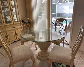 Pedestal and glass top table, 4 chairs, excellent condition