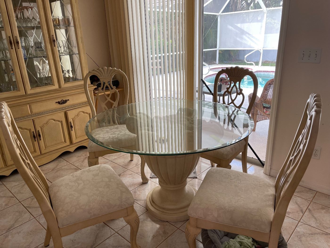 Pedestal and glass top table, 4 chairs, excellent condition