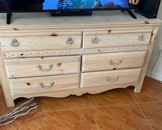 Pine dresser, pretty embellishments
Has a matching night stand