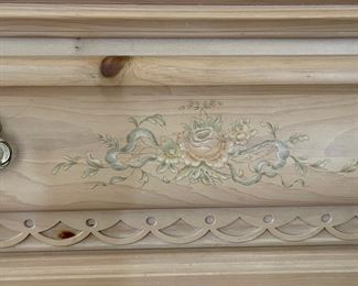 Up close embellishment of dresser and matching night stand