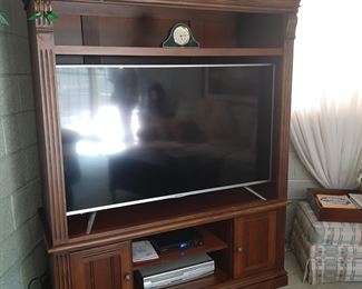 56 inch Sharp TV and entertainment center