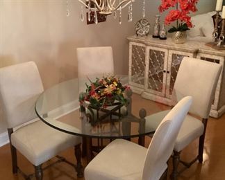 Haverty’s round glass top pedestal table, 54.5 diameter x 30H                                                                               (4) Haverty’s Avondale II  chairs, 19L x 20W x 41H 