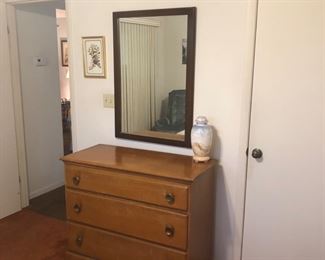 Small dresser.  Framed mirror