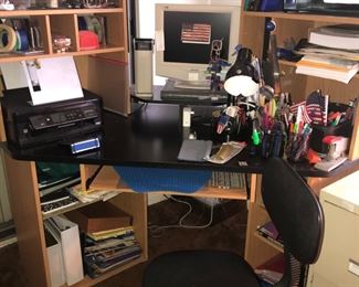 Computer desk, office supplies, files, pens, pencils, tools, paper, discs, etc
