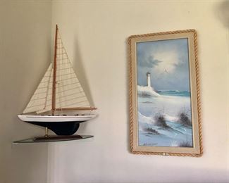 Model boat.  Sea/lighthouse painting
