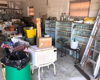 Garage.  Canning jars, lids, canning supplies.  Gardening tools, pots, ladders