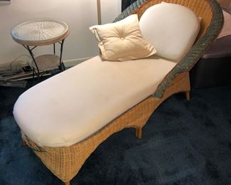 Wicker chaise lounge and side table