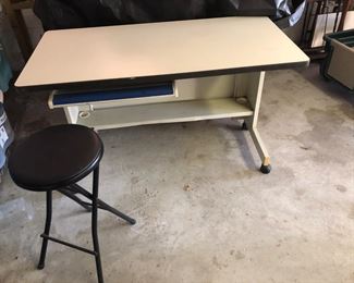 Industrial rolling metal desk by Marvel Procucts with Melamine top.  
