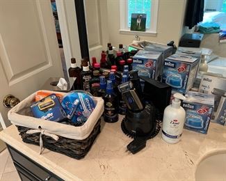 Sealed Mens Razors, Tanning Oils & Braun Clean & Charge Refills