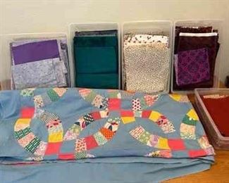 Patchwork Quilt With Boxes Of Fabric By Color