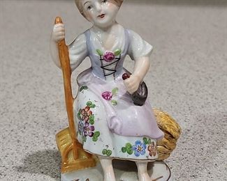 Pre-Sale: Vintage Germany Dresden Sitzendorf Porcelain Figurine Girl Woman Sitting w/ Rake
