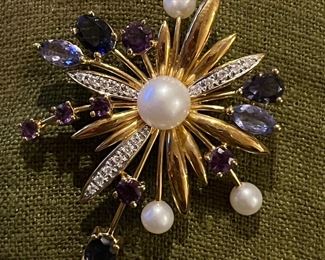 Massive tanzanite, pearl and diamond