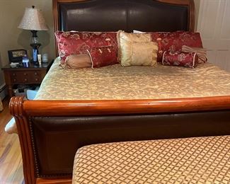  KING SIZED LEATHER BED SET INCLUDES BED, TRIPLE DRESSER AND MIRROR, TALL DRESSER AND 2 NIGHTSTANDS. MATTRESS AND BOXSPRING ARE NOT INCLUDED,  PRESALE IS AVAILABLE $1800 TEXT  BRENDA FOR APPT. 973-418-1286