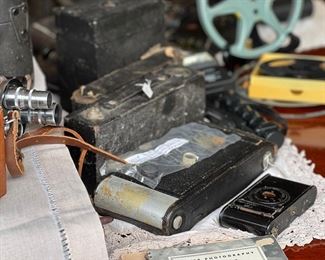 Large collection of antique Kodak cameras and Revere movie cameras