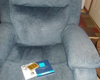 One of 2 nice recliners 