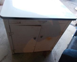 Enamel top cabinet needs repair