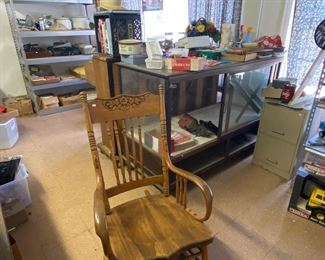 Rocker and antique store display cabinet