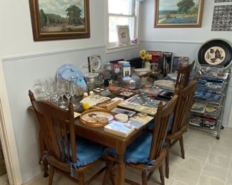 Table with leaves and four chairs