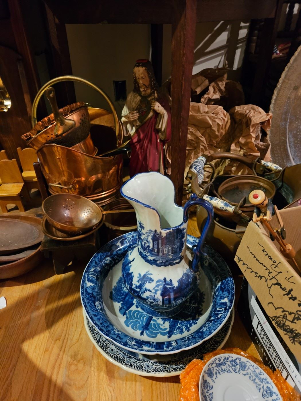 Blue and white pitcher and bowl, Copper items, religious statue