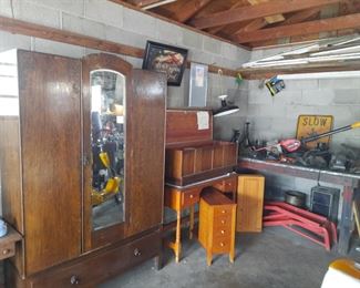 Antique armoire, kneehole desk and tools