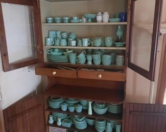 Cupboard with the vintage fire king jadite collection