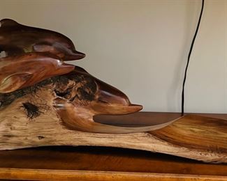Dolphin carving on wood 27” wide x 11” tall